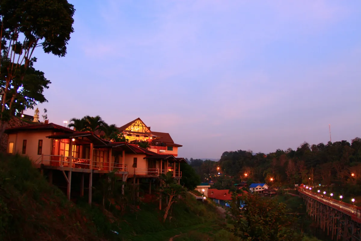 Cliffside Villas at Dusk — Mon Bridge View